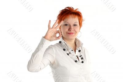 Happy lucky young woman with ok gesture