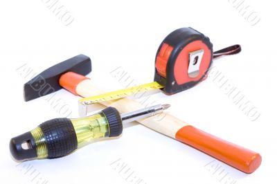 Tape-measure, hammer, screwdriver