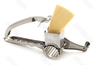 grater and cheese on white