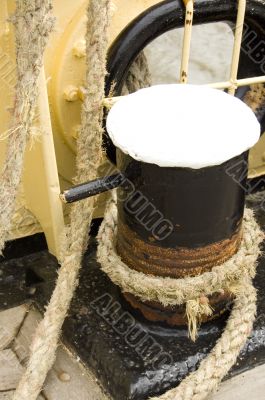 Iron bollard with ship ropes