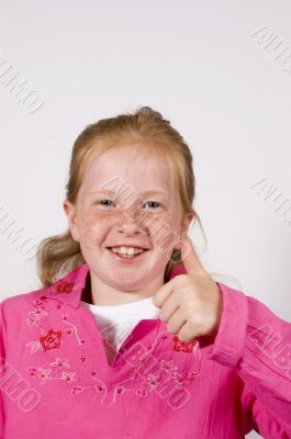 cute little girl with thumb up