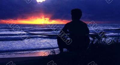 surfer waiting for the sun