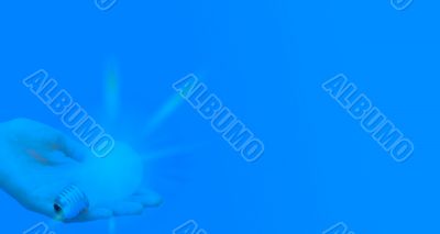 Background with lit lightbulb