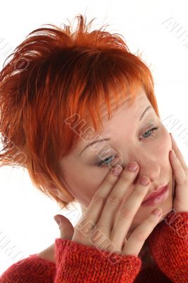 sad red haired woman isolated on white background