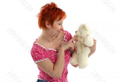 red haired woman with teddy bear isolaited on white background