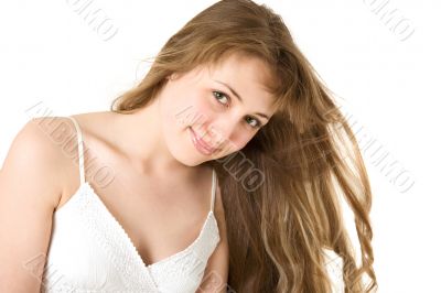 Young woman in the wind looking