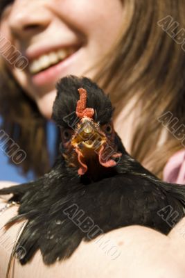 child and her chicken