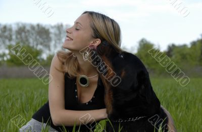 happy young teenager and her dog