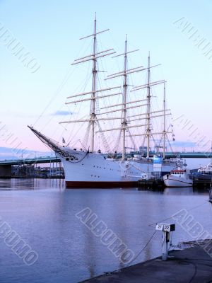 sail ship in the harbour in beautiful sunset