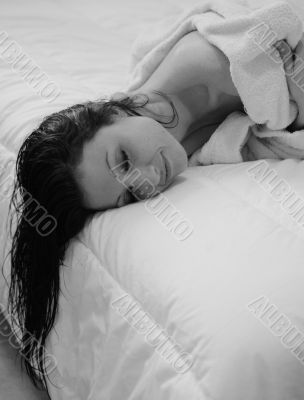 smiling woman in bathrobe