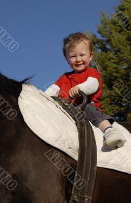riding little boy