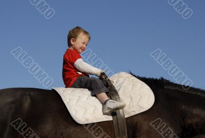 riding little boy