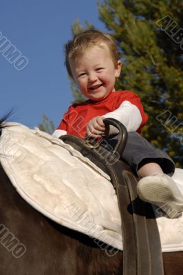 riding little boy