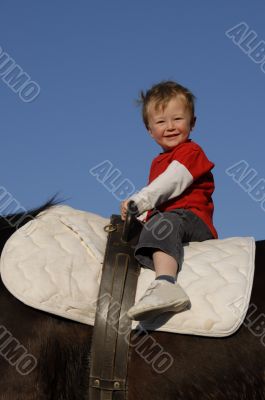 riding little boy