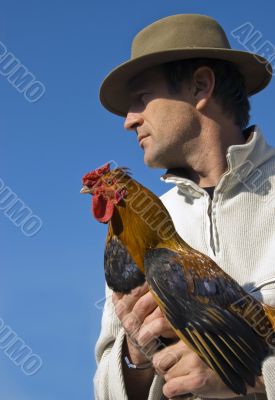 man and rooster