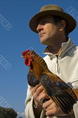 man and chicken