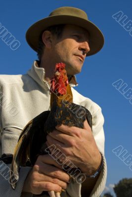 man and chicken