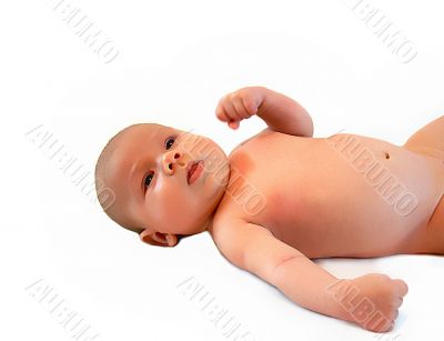 The beautiful kid lays on a back The beautiful kid lays on a back