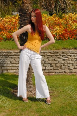 Cute young lady in in gardens