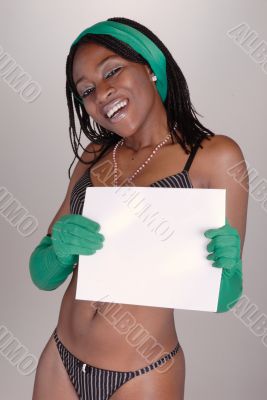 attractive young African girl holding sign