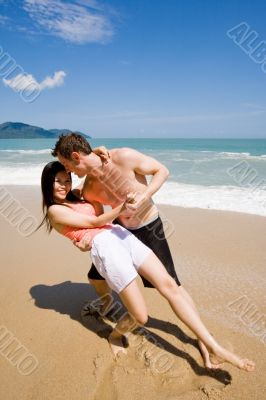 happy couple at the beach