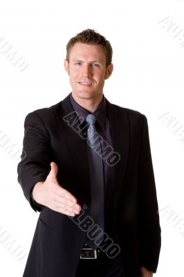 caucasian man in business suit making a hand shake