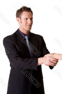 caucasian man in business suit making a hand shake