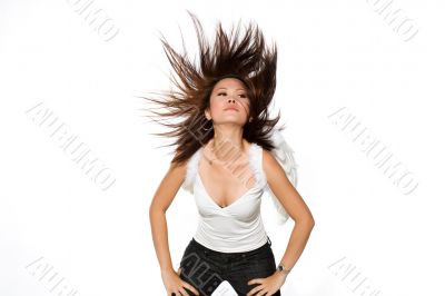 woman with angel wings flinging her hair