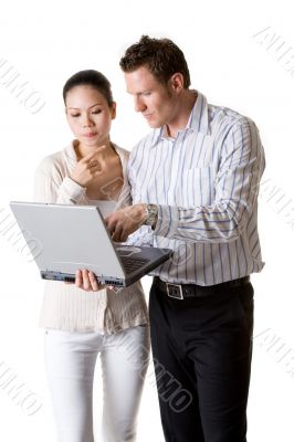 A businesswoman and businessman pay attention A businesswoman and businessman pay attention
