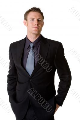caucasian man smilling wears formal business attire