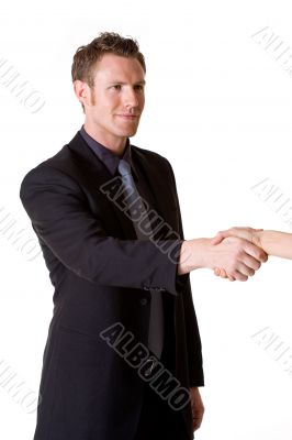 caucasian man in business suit making a hand shake caucasian man in business suit making a hand shake