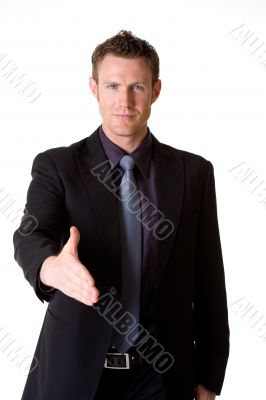 caucasian man in business suit making a hand shake