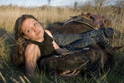woman and horse in field