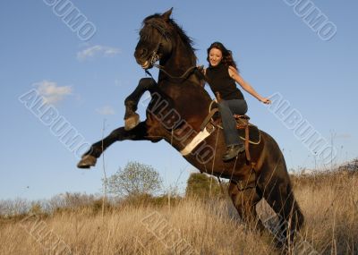 rearing stallion and girl