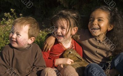 three children and bunny