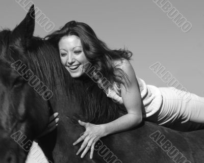 laughing woman and stallion