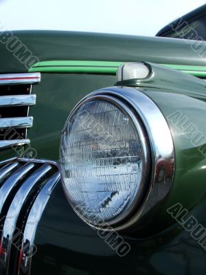 Headlight and Grill Green Old Pickup Truck