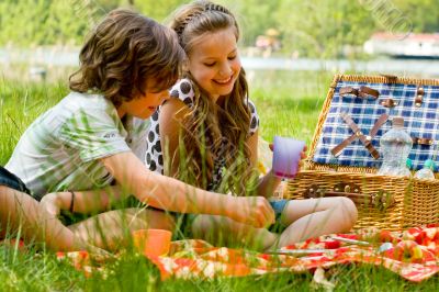 Kids having fun while picnicking Kids having fun while picnicking