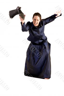 Woman with long curly hair throwing her boot Woman with long curly hair throwing her boot