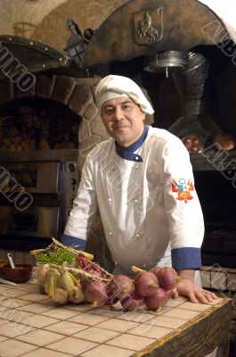 Cook cooking on the kitchen.