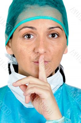 Lady doctor gesture asks silence