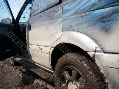 Sprayed car with dirt