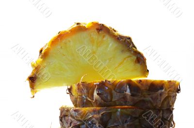 Pineapple cut on a part on a white background Pineapple cut on a part on a white background