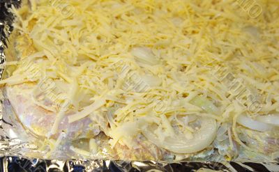 raw meat, onions and cheese