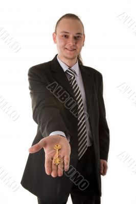 Businessman holding key