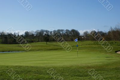 Golf hole with flag