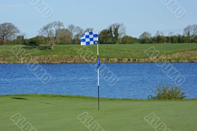 Golf flag and hole