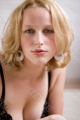 Sexy voluptuous blonde in pin-up pose Sexy voluptuous blonde in pin-up pose