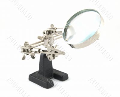 Clip with a magnifier