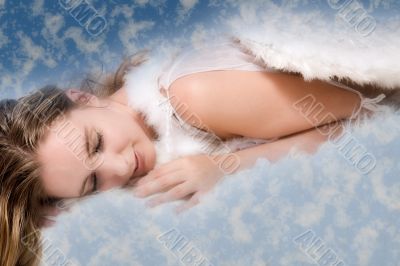 Beautiful angel surrounded by clouds